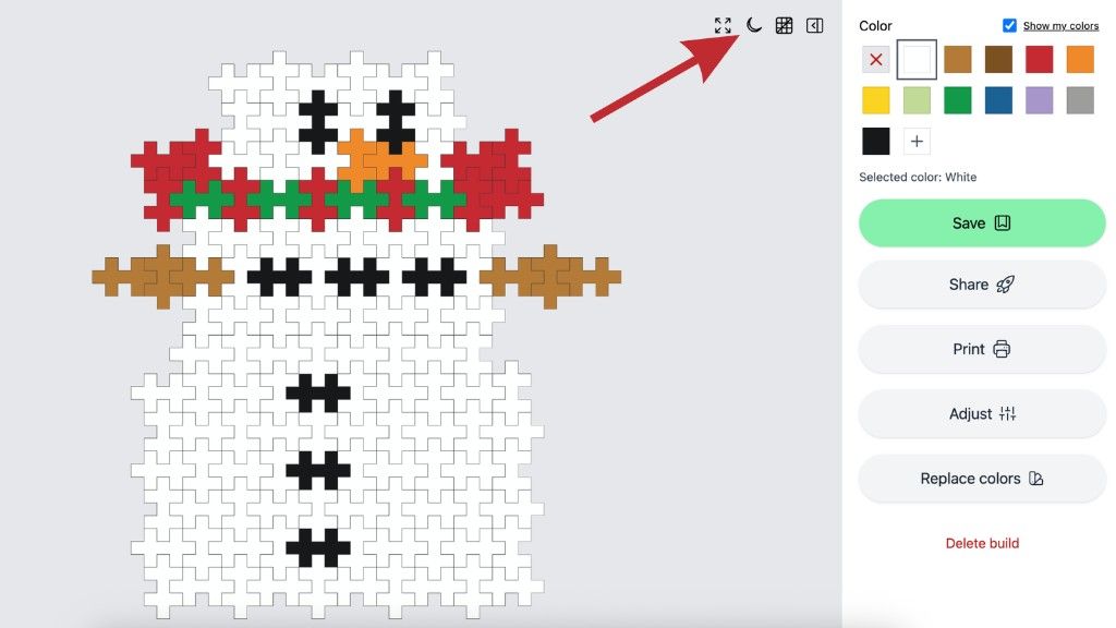 Plus-Plus Creator Studio 2D builder with a red arrow pointing to the dark mode moon button in the top-right toolbar